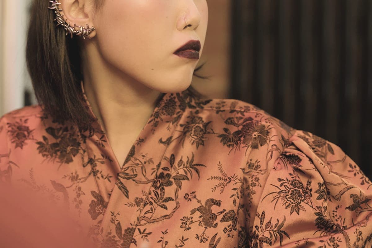 A profile view of an ear wearing a cuff on the outer edge